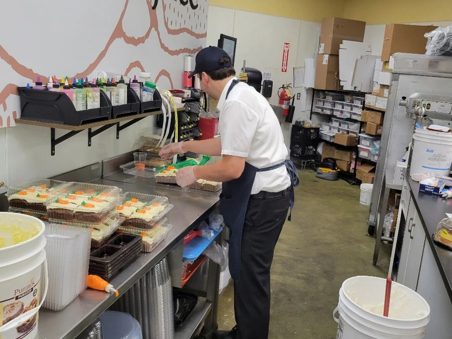 man with a disability working on the bakery at Shoprite